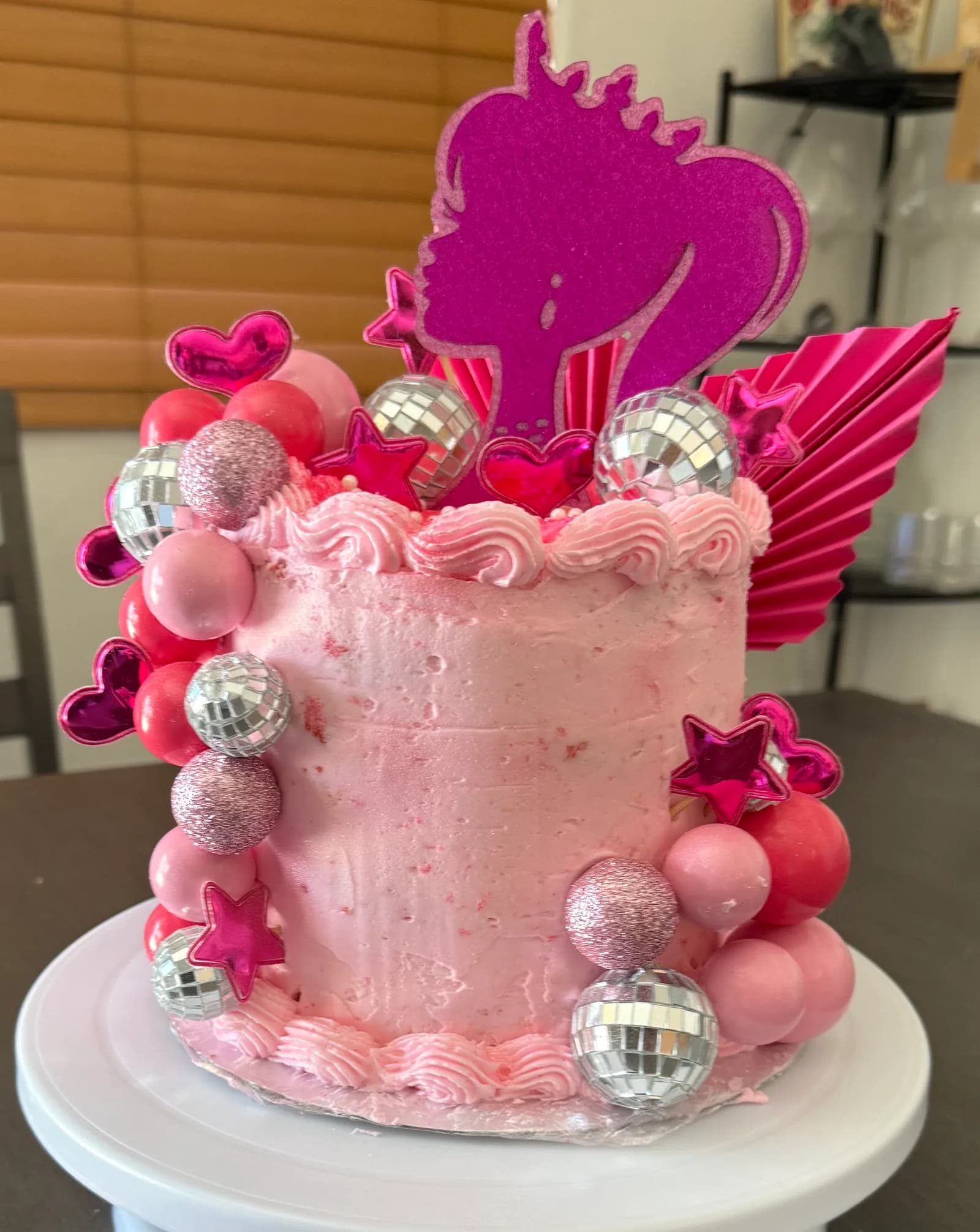 Pink disco birthday cake with mirror balls